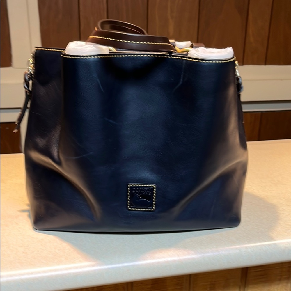 Dooney and Burke Navy Florentine bag.
